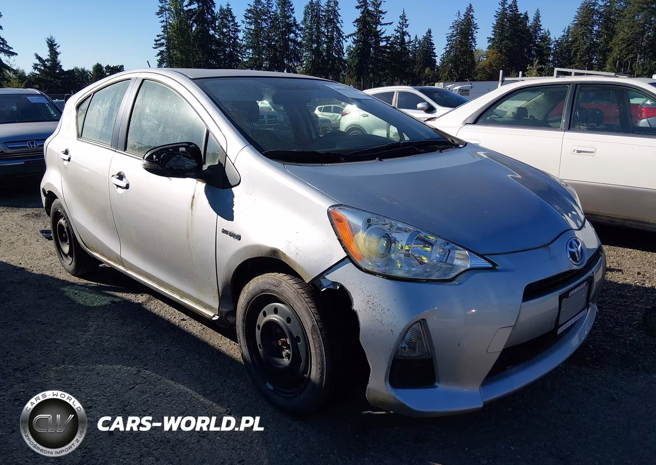 2014 Toyota Prius C Two VIN:JTDKDTB35E1075218 - 1
