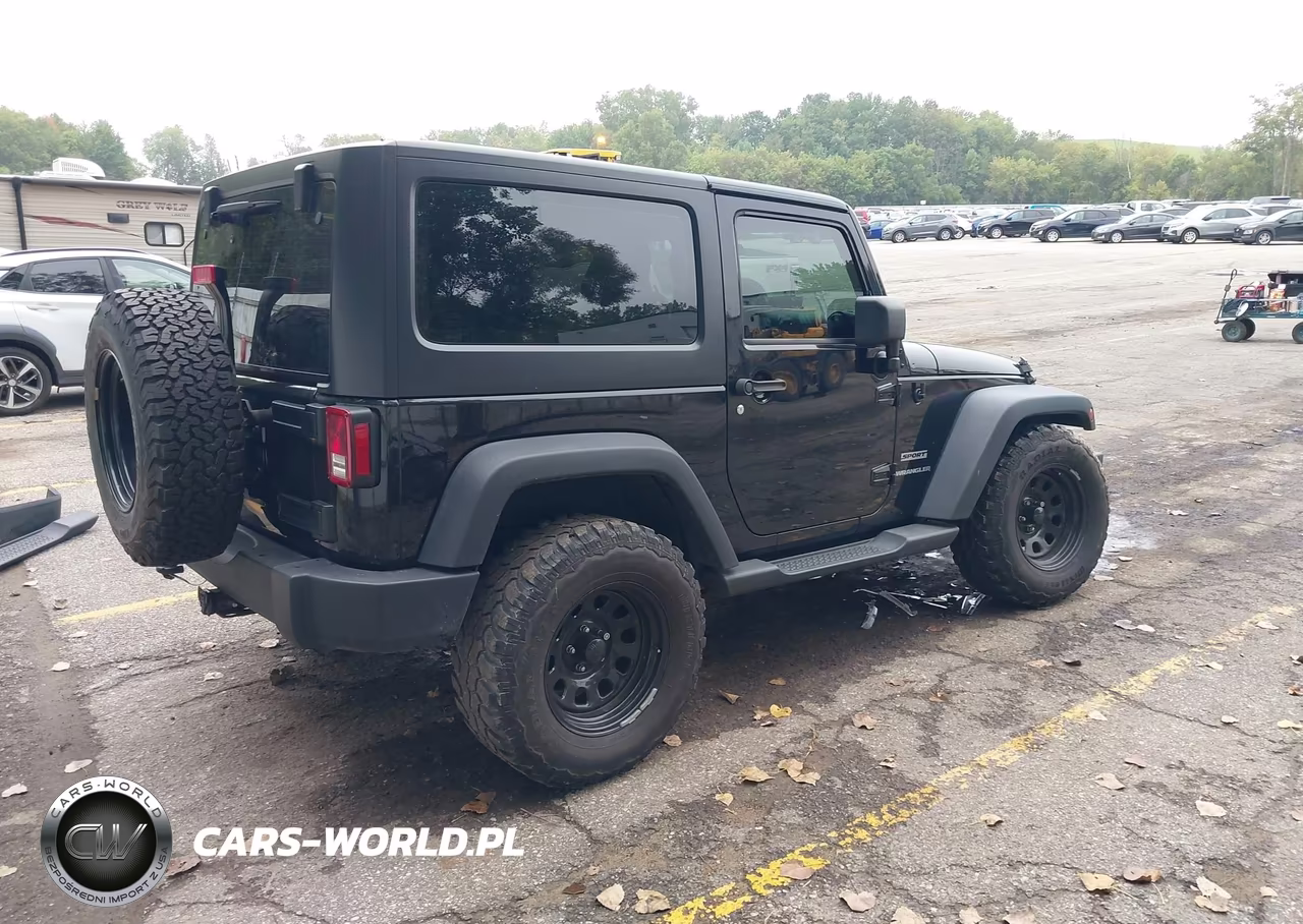 2015 Jeep Wrangler Sport VIN:1C4AJWAGXFL514705 - 4