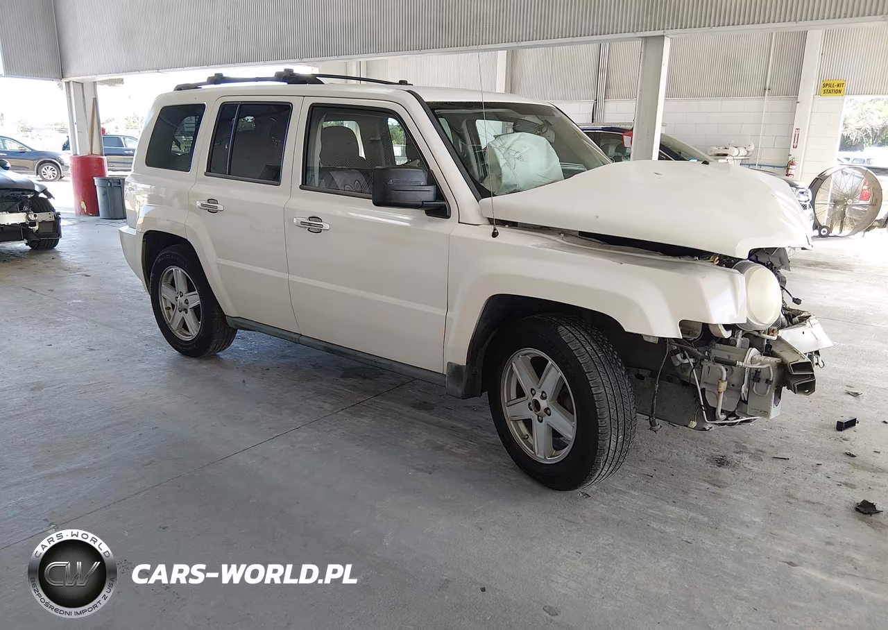 2010 Jeep Patriot Sport VIN:1J4NT2GB7AD556410 - 1