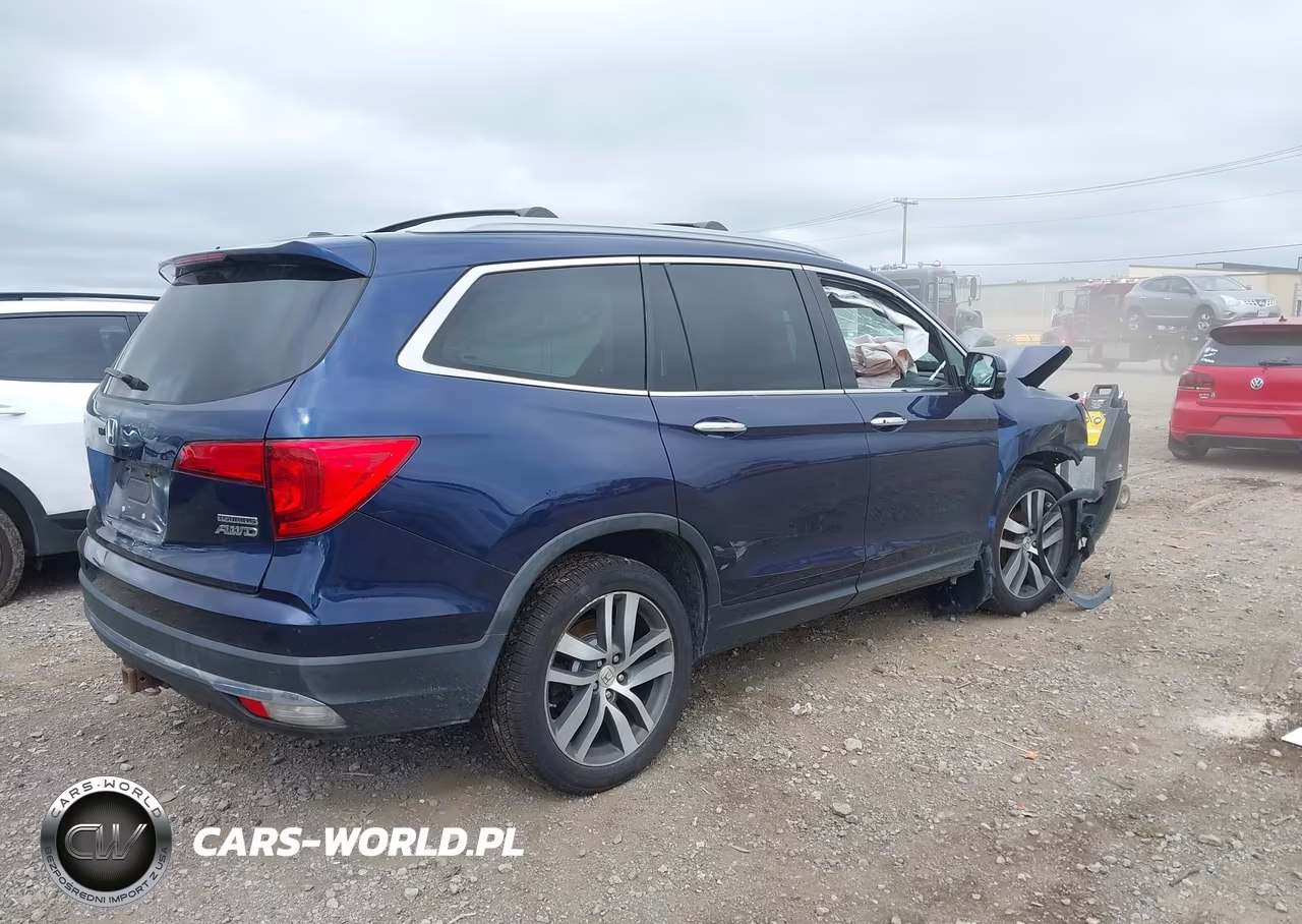 2018 Honda Pilot Touring VIN:5FNYF6H91JB057348 - 4