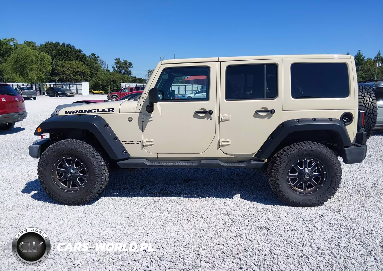 2011 Jeep Wrangler Unlimited Sahara VIN:1J4HA5H18BL603980 - 14