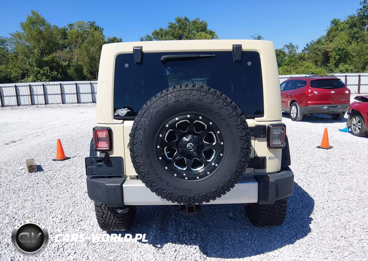 2011 Jeep Wrangler Unlimited Sahara VIN:1J4HA5H18BL603980 - 16