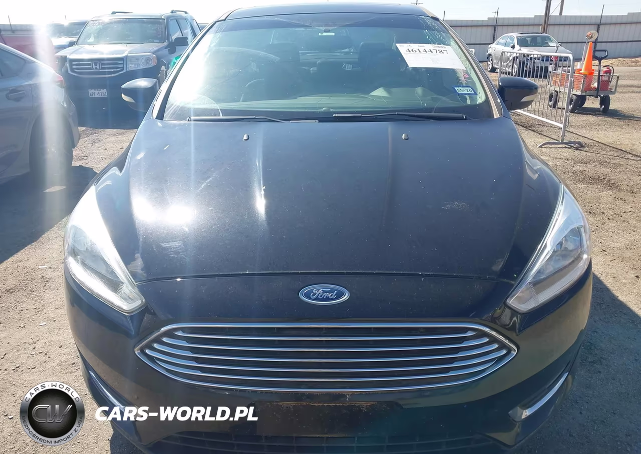 2017 Ford Focus Titanium VIN:1FADP3J22HL238656 - 13