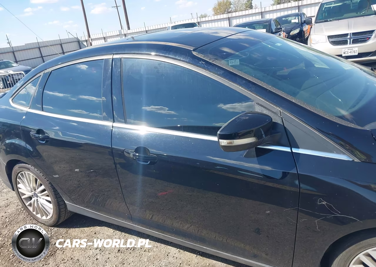 2017 Ford Focus Titanium VIN:1FADP3J22HL238656 - 14