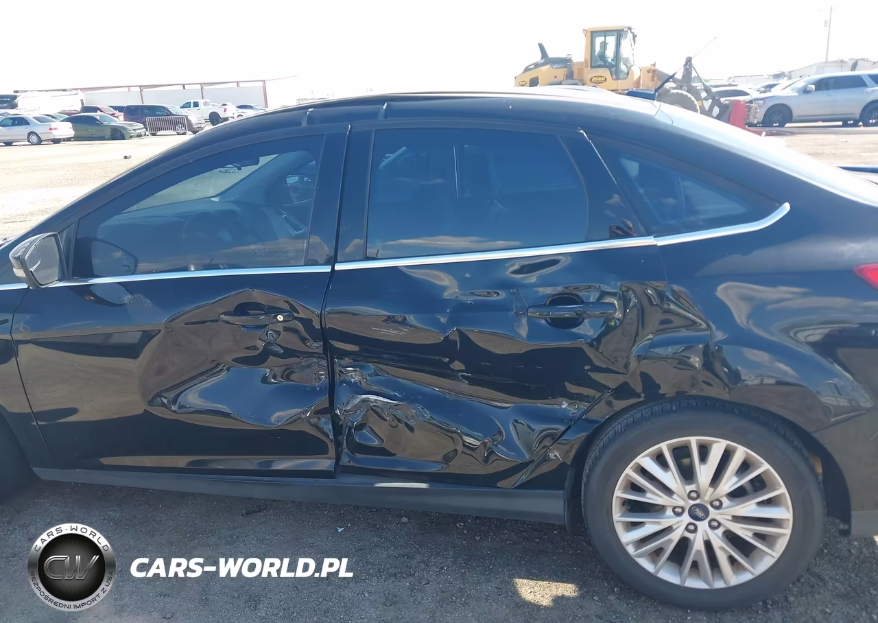 2017 Ford Focus Titanium VIN:1FADP3J22HL238656 - 15