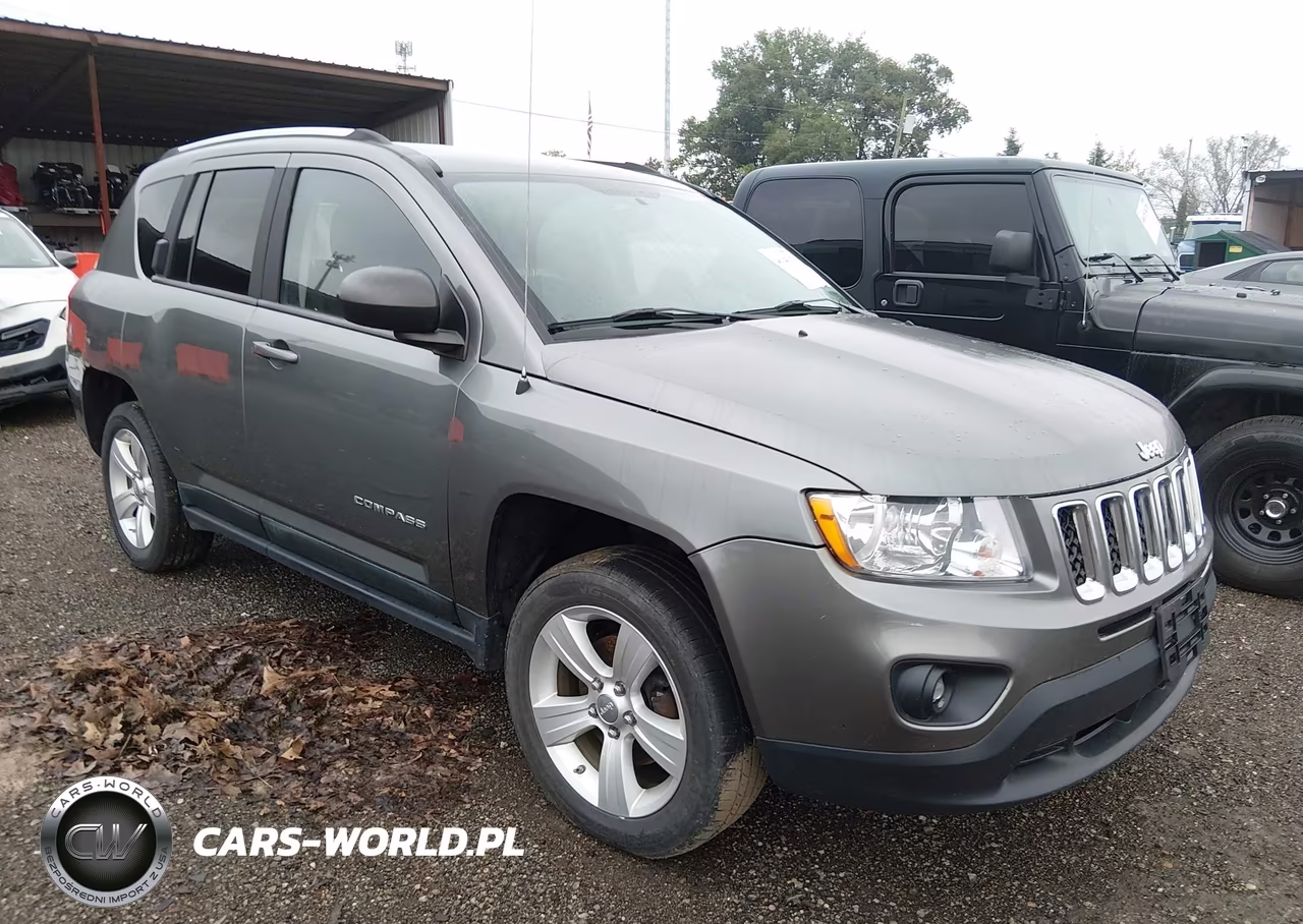2011 Jeep Compass VIN:1J4NF1FB9BD243945 - 1