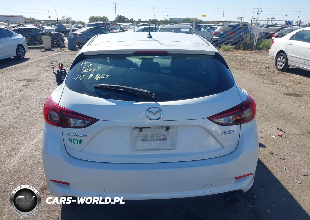 2018 Mazda Mazda3 Touring VIN:3MZBN1L37JM180241 - 16