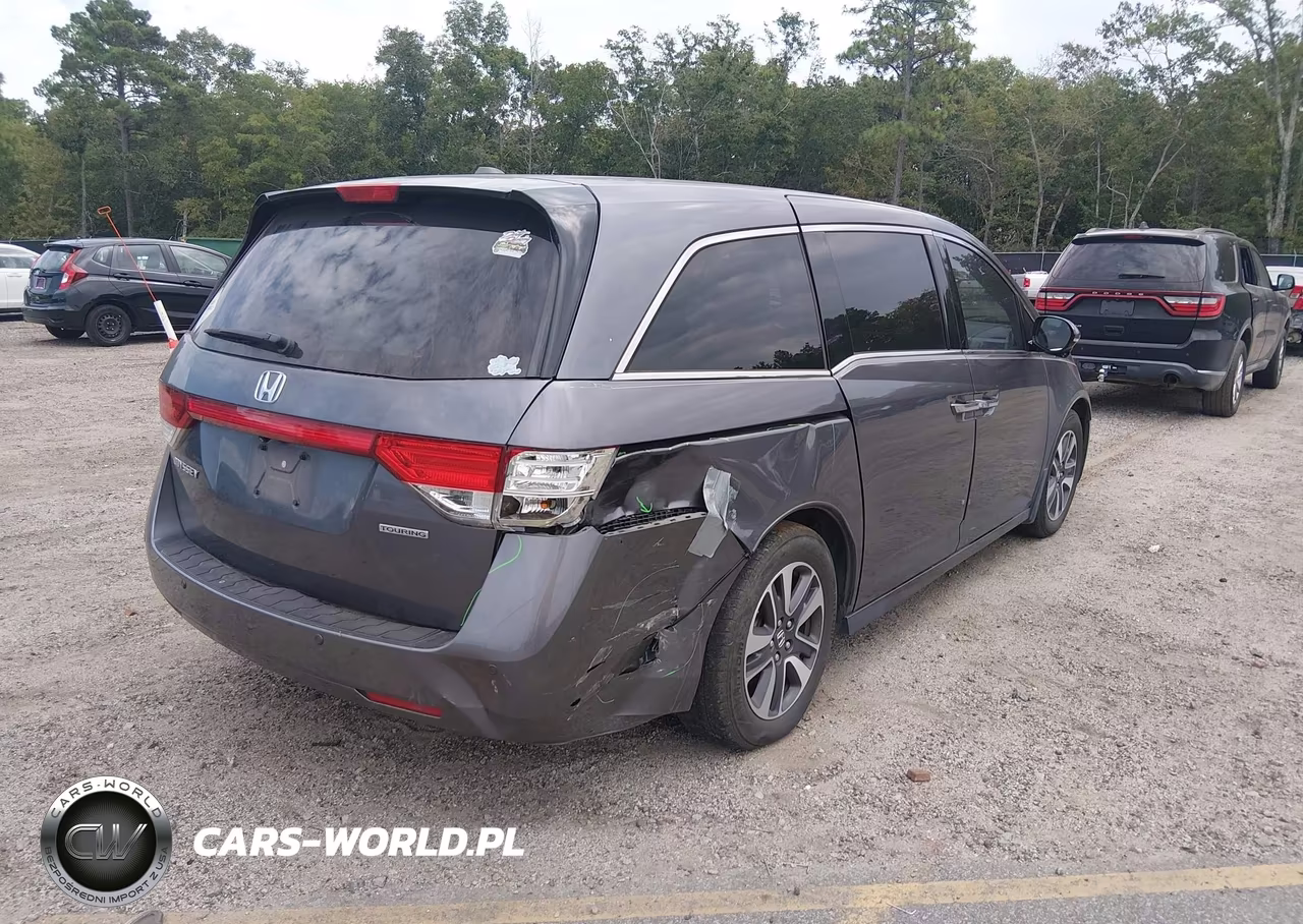 2015 Honda Odyssey Touring-Touring Elite VIN:5FNRL5H90FB027899 - 4