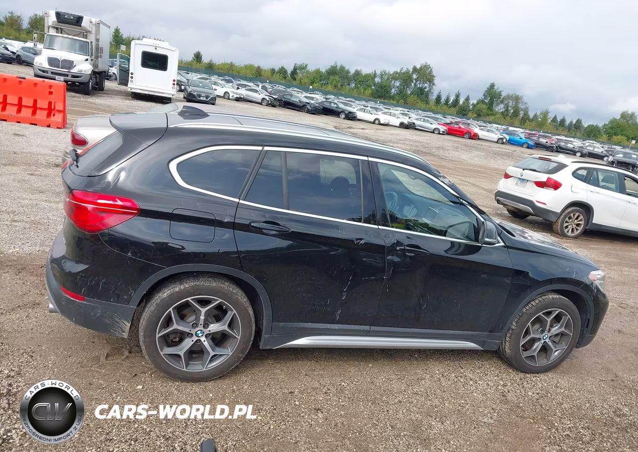 2018 BMW X1 xDrive28I VIN:WBXHT3C32J5L29887 - 13