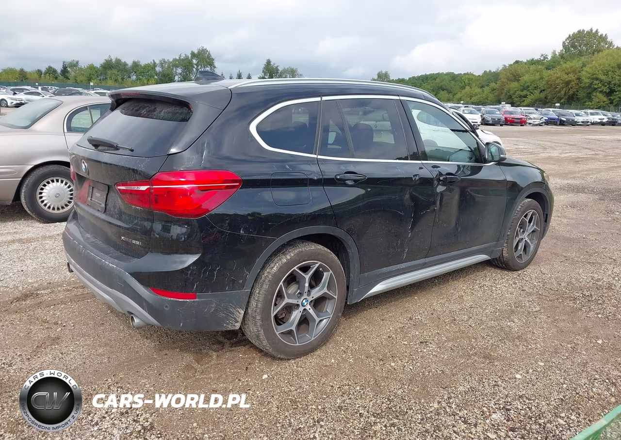 2018 BMW X1 xDrive28I VIN:WBXHT3C32J5L29887 - 4