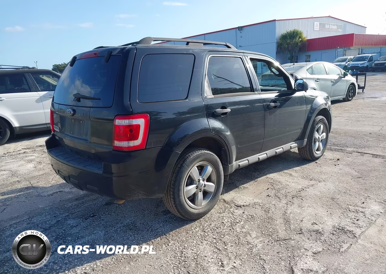 2009 Ford Escape Xlt VIN:1FMCU03G09KA20630 - 4