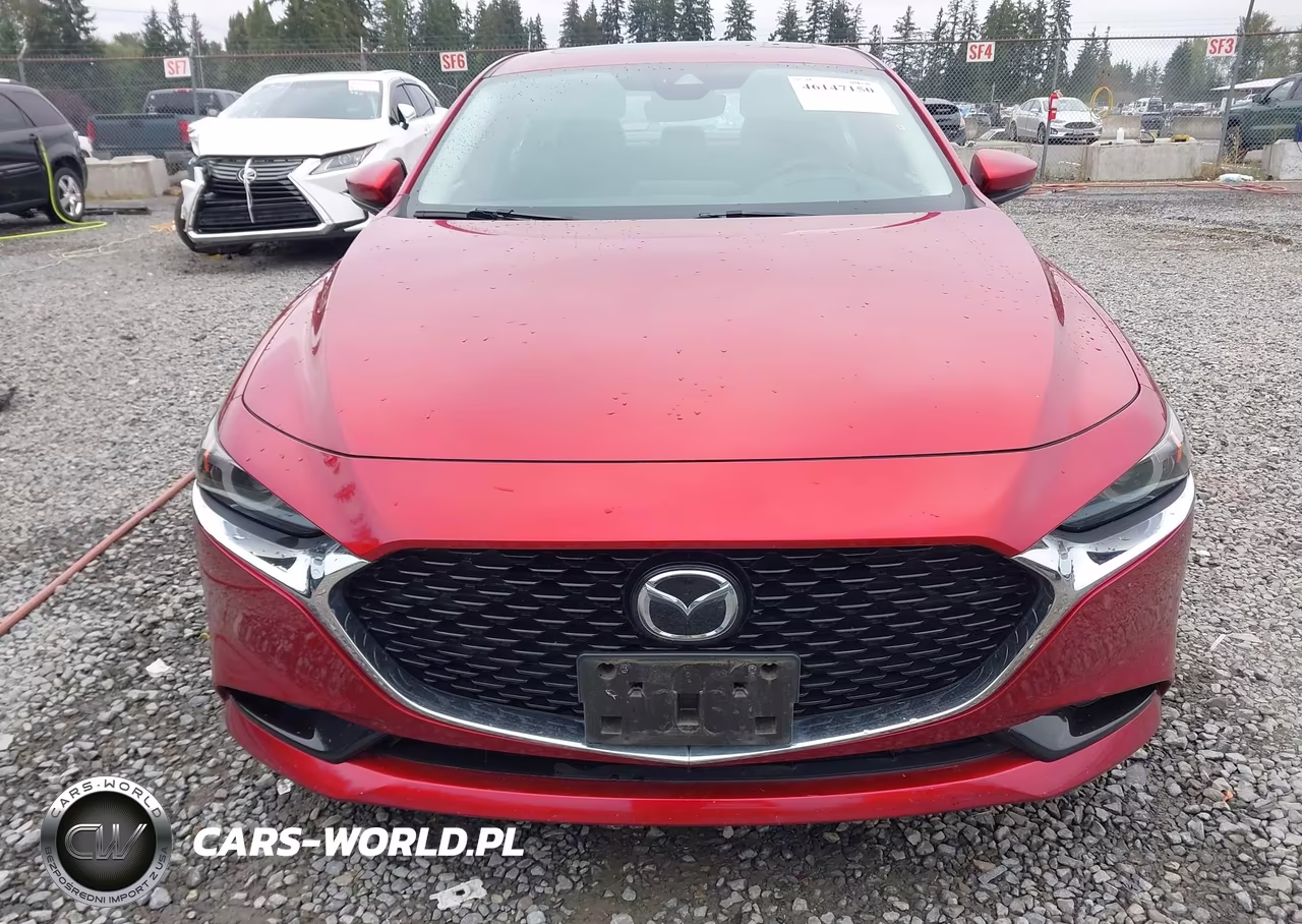 2019 Mazda Mazda3 Premium Package VIN:JM1BPBEM6K1139106 - 11
