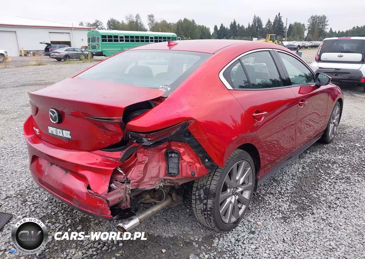 2019 Mazda Mazda3 Premium Package VIN:JM1BPBEM6K1139106 - 4