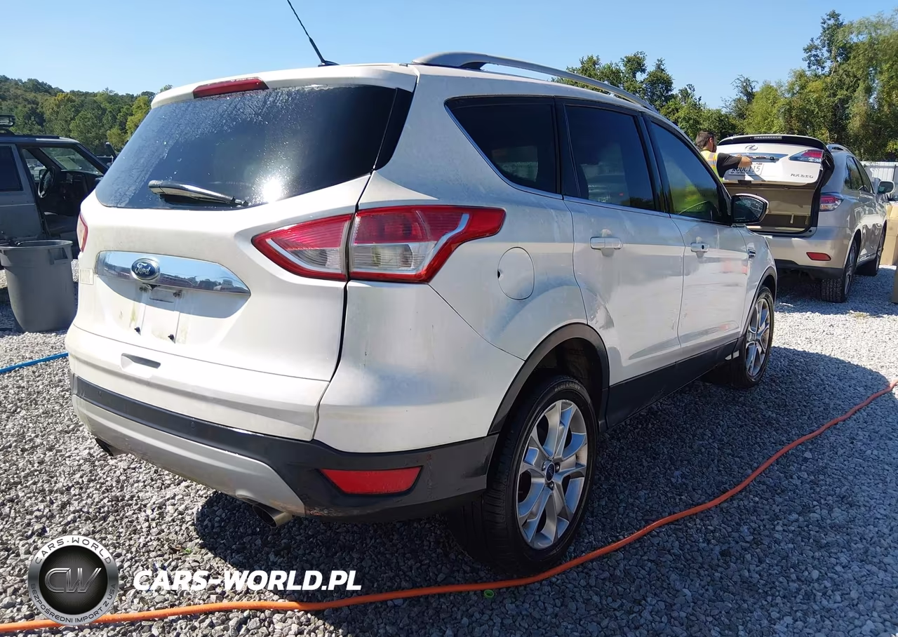 2015 Ford Escape Titanium VIN:1FMCU0J98FUC35225 - 4