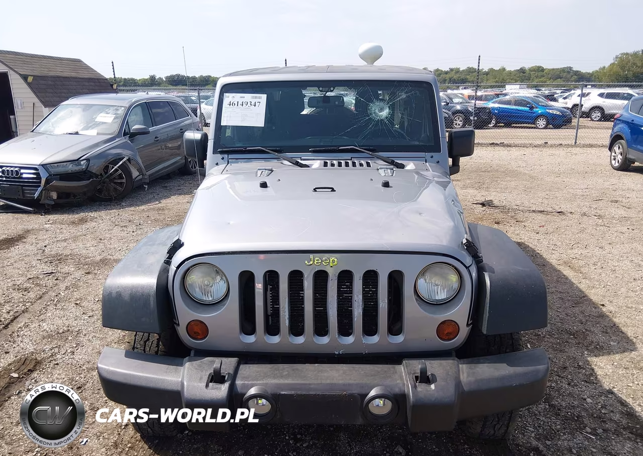 2013 Jeep Wrangler Unlimited Sport VIN:1C4BJWDG0DL700007 - 12