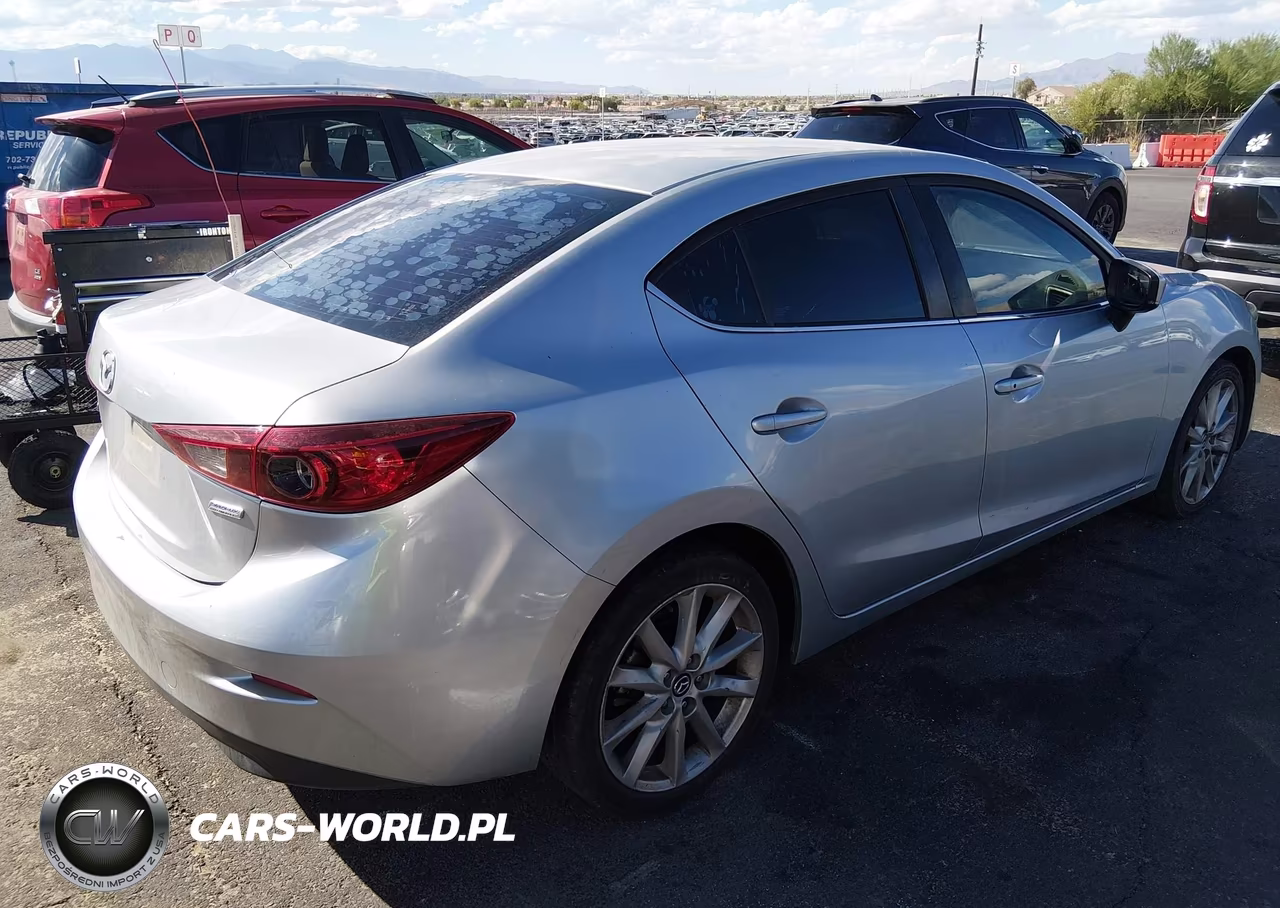 2017 Mazda Mazda3 Touring VIN:JM1BN1V77H1100737 - 4