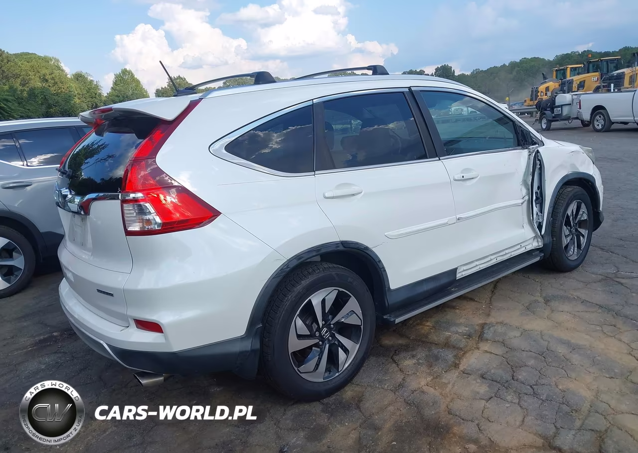 2015 Honda Cr-V Touring VIN:5J6RM3H90FL021769 - 4