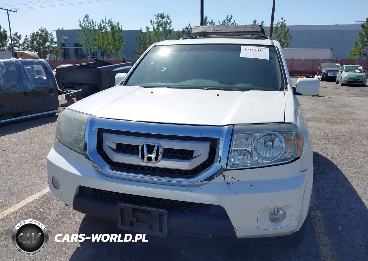 2011 Honda Pilot Touring VIN:5FNYF4H90BB030647 - 12