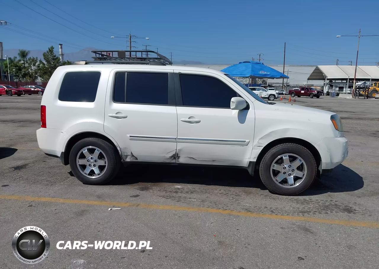 2011 Honda Pilot Touring VIN:5FNYF4H90BB030647 - 13