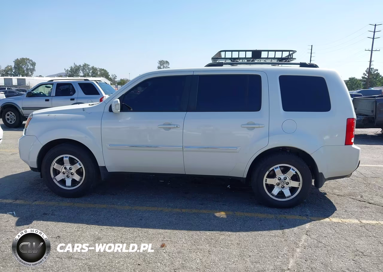 2011 Honda Pilot Touring VIN:5FNYF4H90BB030647 - 14