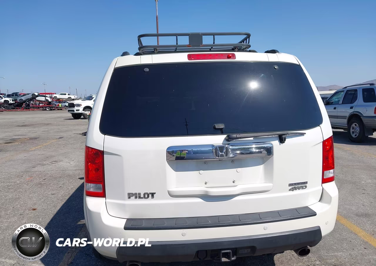 2011 Honda Pilot Touring VIN:5FNYF4H90BB030647 - 16
