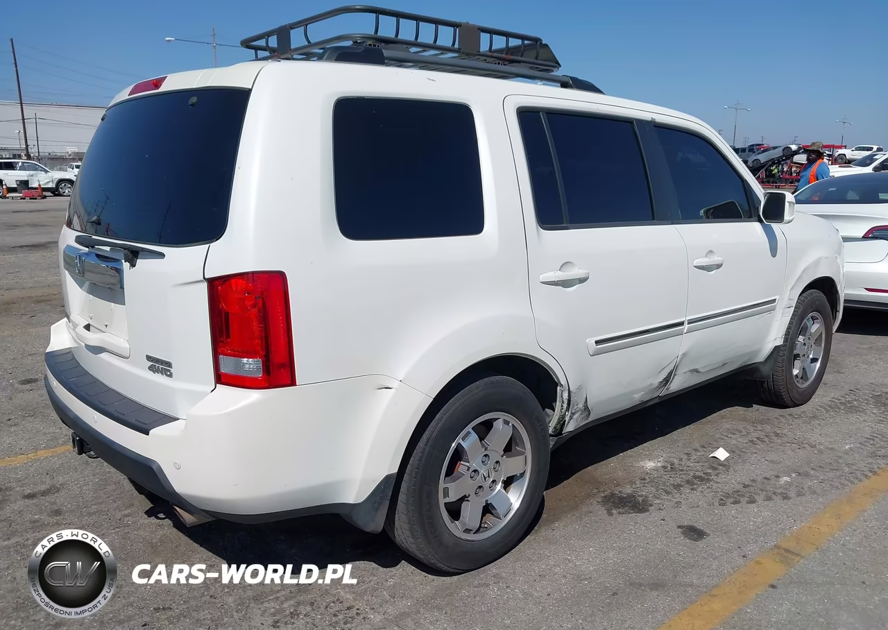 2011 Honda Pilot Touring VIN:5FNYF4H90BB030647 - 4