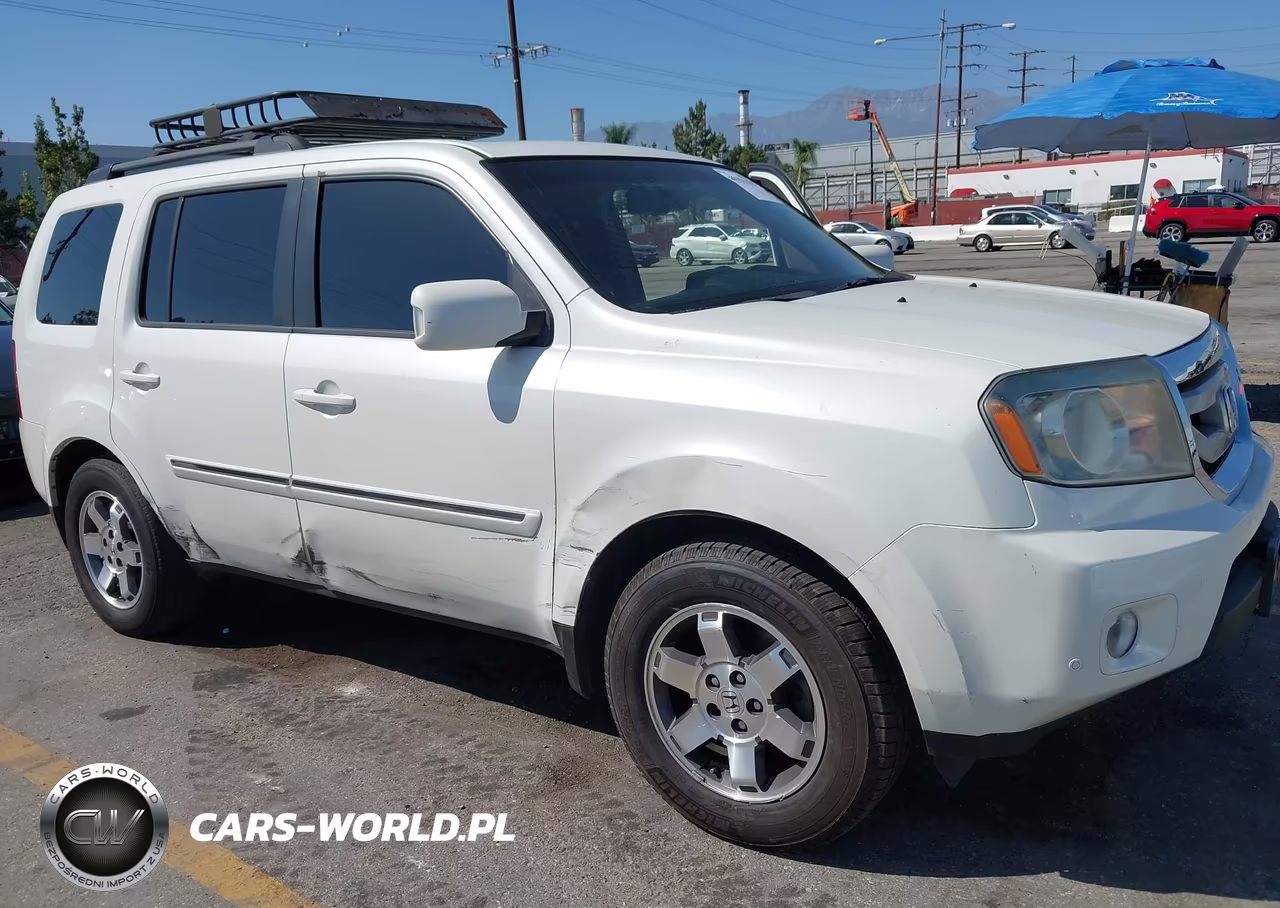 2011 Honda Pilot Touring VIN:5FNYF4H90BB030647 - 6