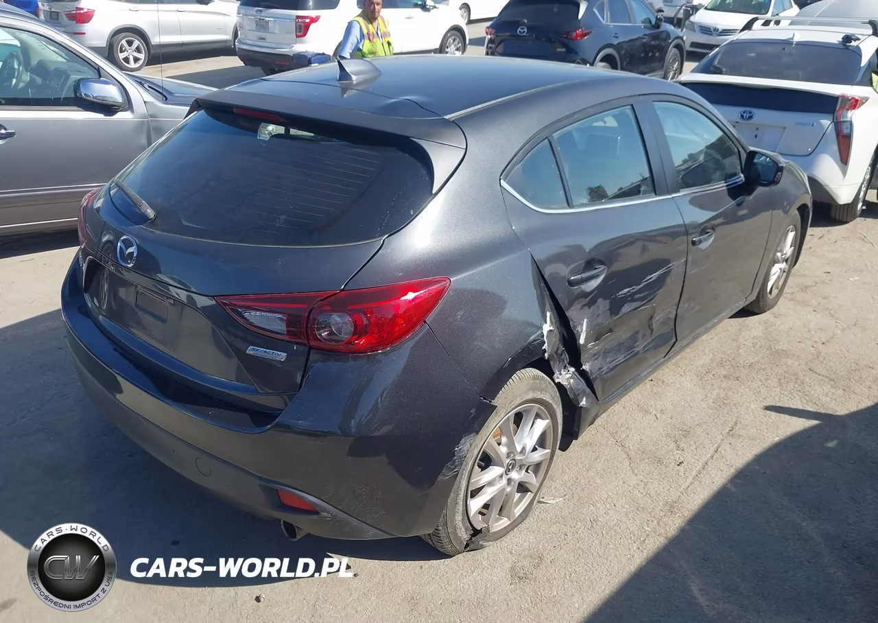 2015 Mazda Mazda3 I Grand Touring VIN:JM1BM1M71F1240932 - 4