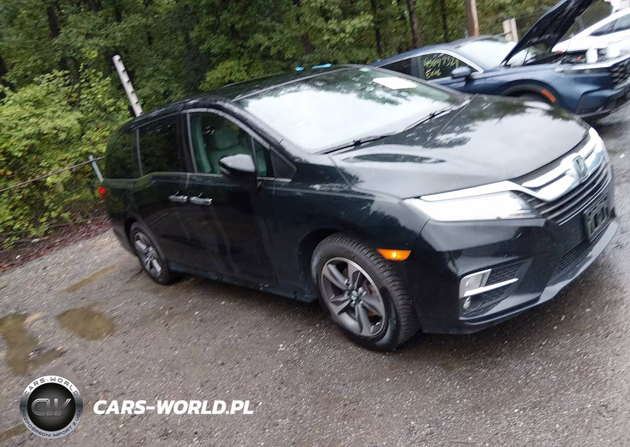 2018 Honda Odyssey Touring VIN:5FNRL6H87JB034371 - 1