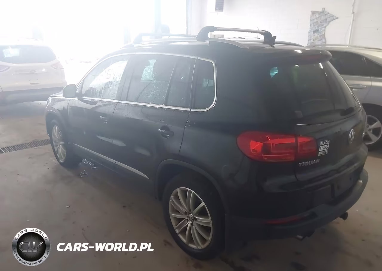 2014 Volkswagen Tiguan Sel VIN:WVGBV3AX2EW622929 - 3