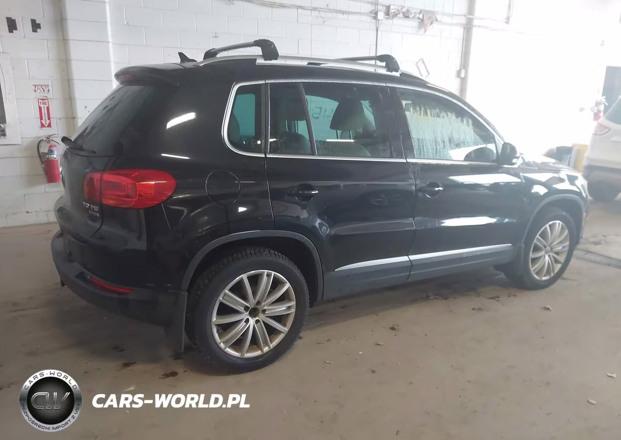 2014 Volkswagen Tiguan Sel VIN:WVGBV3AX2EW622929 - 4