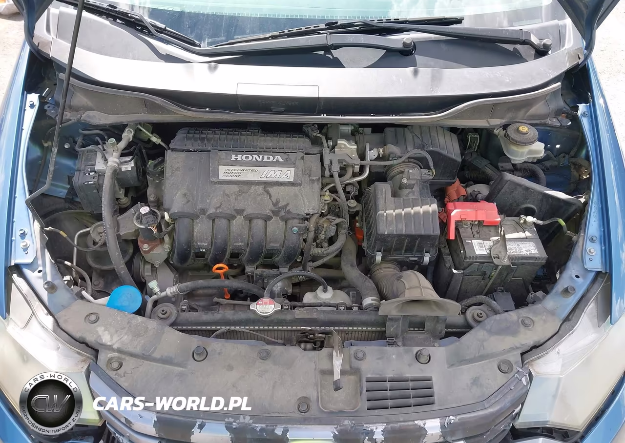 2010 Honda Insight Ex VIN:JHMZE2H7XAS000176 - 10