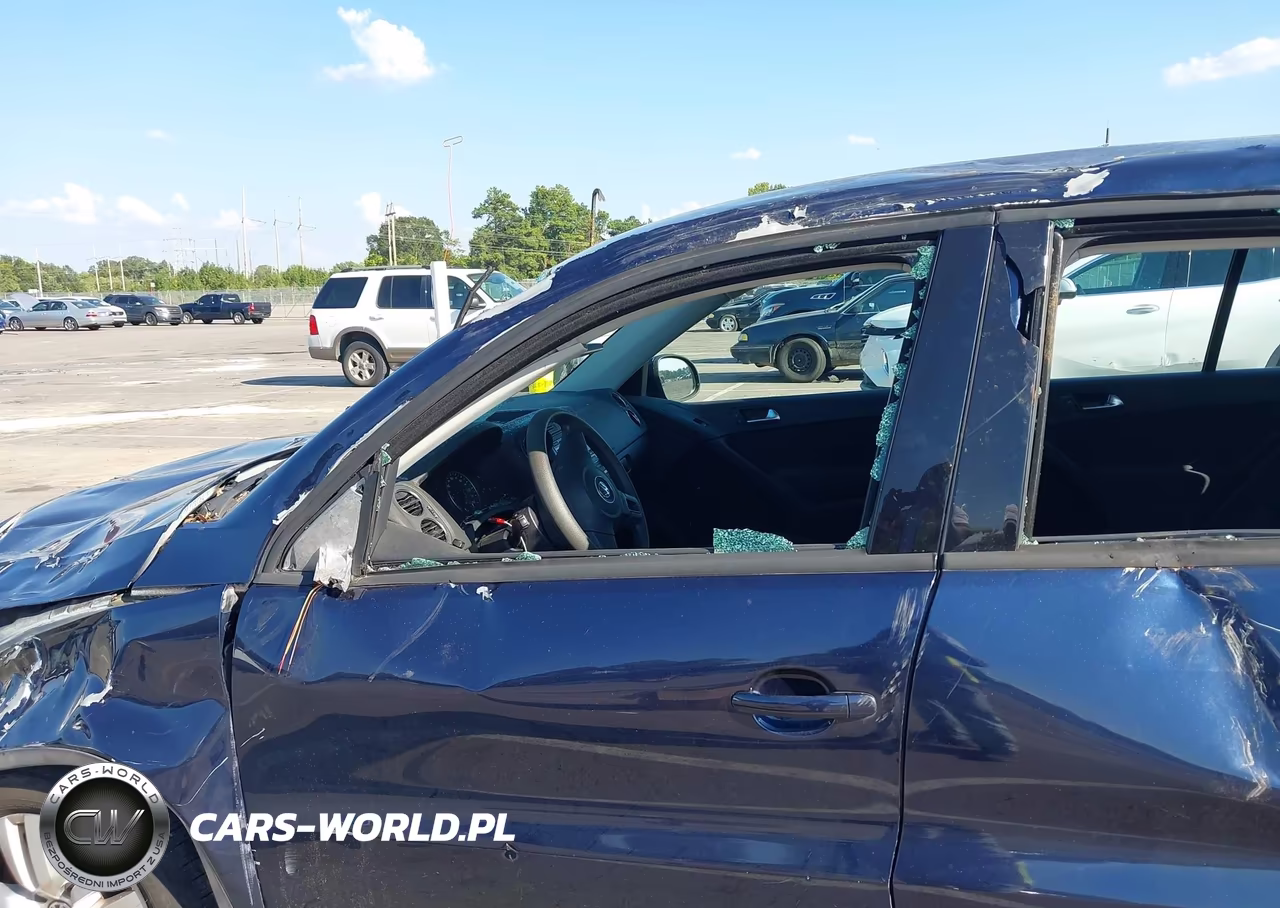 2012 Volkswagen Tiguan S VIN:WVGAV7AX8CW589712 - 14