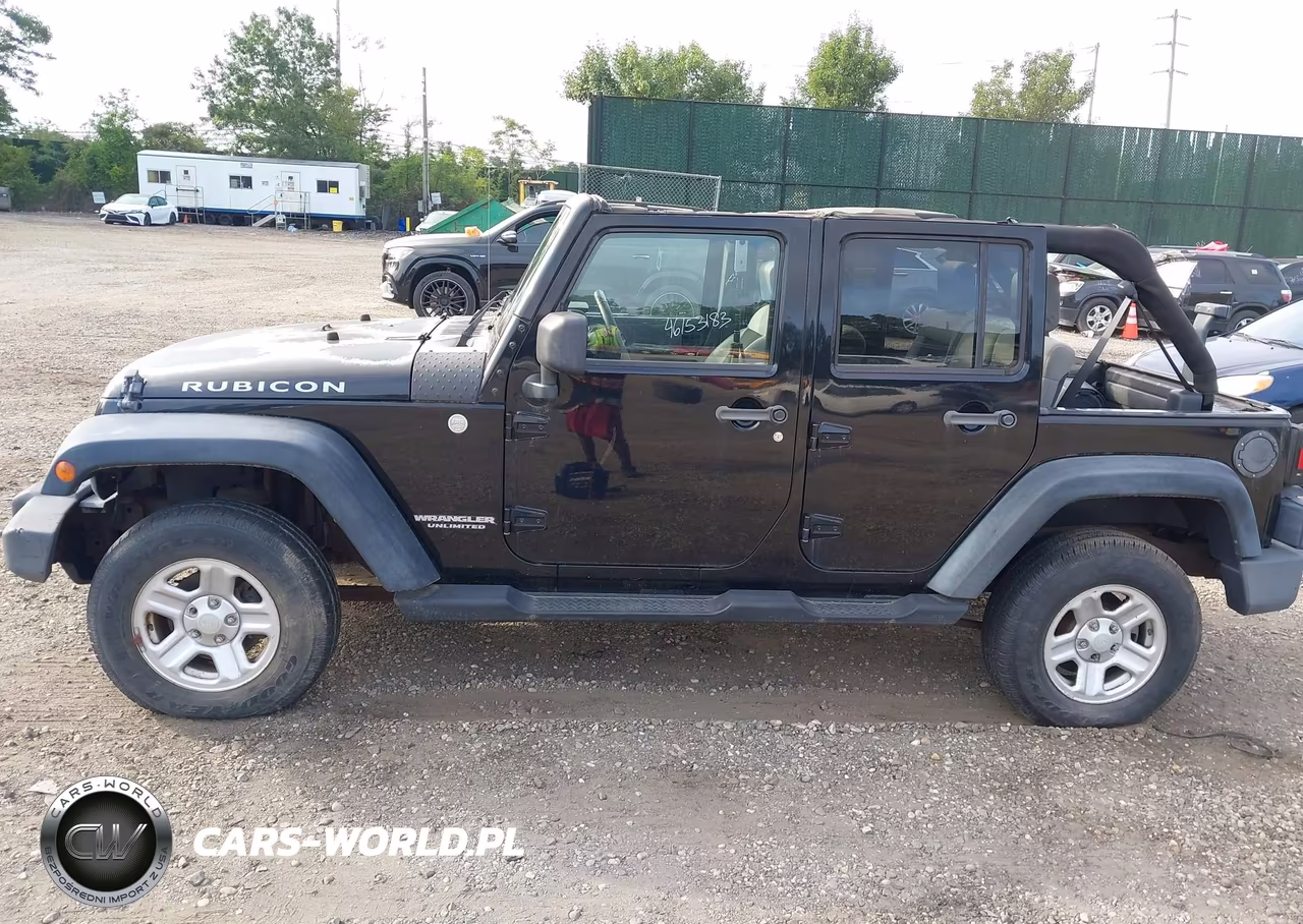 2010 Jeep Wrangler Unlimited Rubicon VIN:1J4HA6H17AL193175 - 14