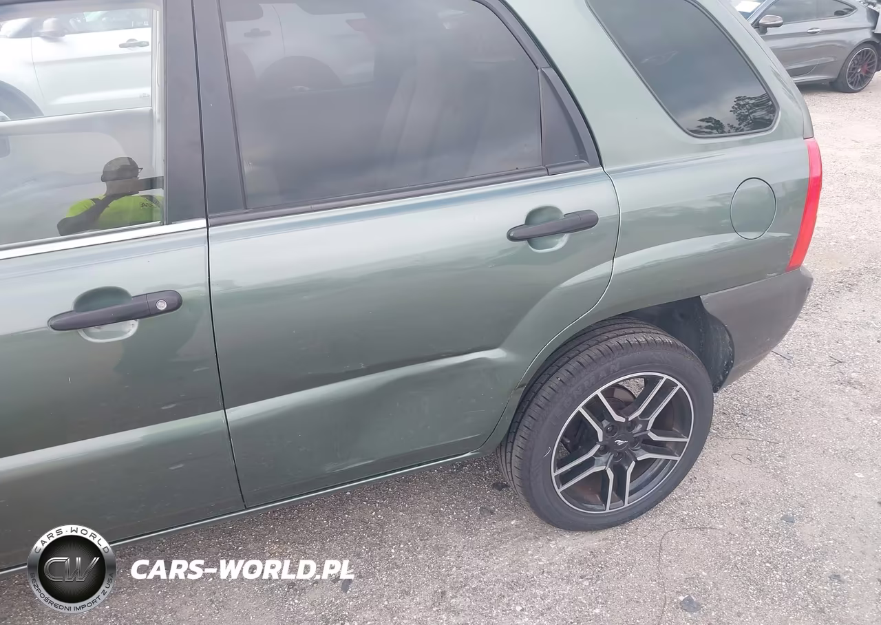 2006 Kia Sportage Lx VIN:KNDJF724867257063 - 12