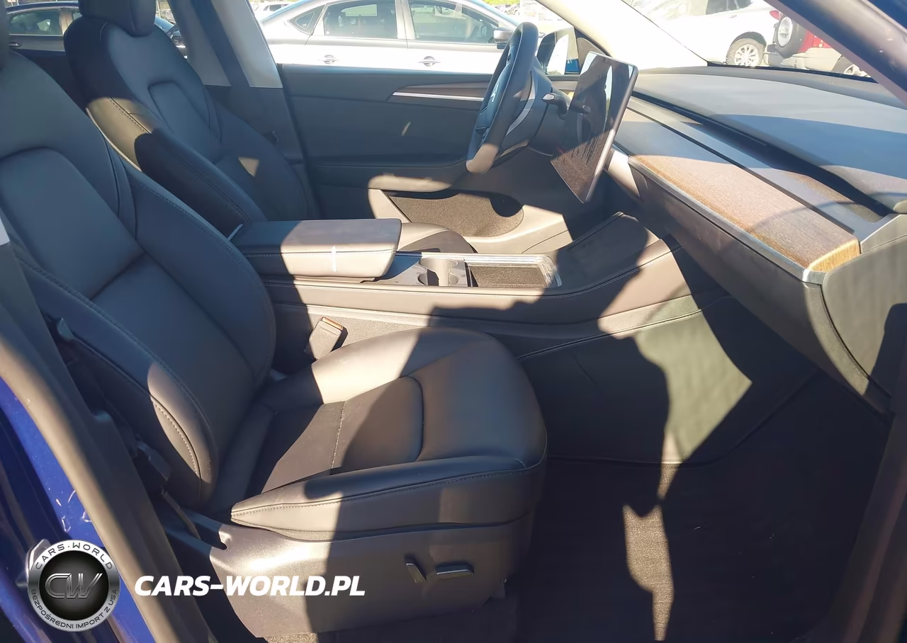 2024 Tesla Model Y Long Range Dual Motor All-Wheel Drive VIN:7SAYGAEE5RF129426 - 5