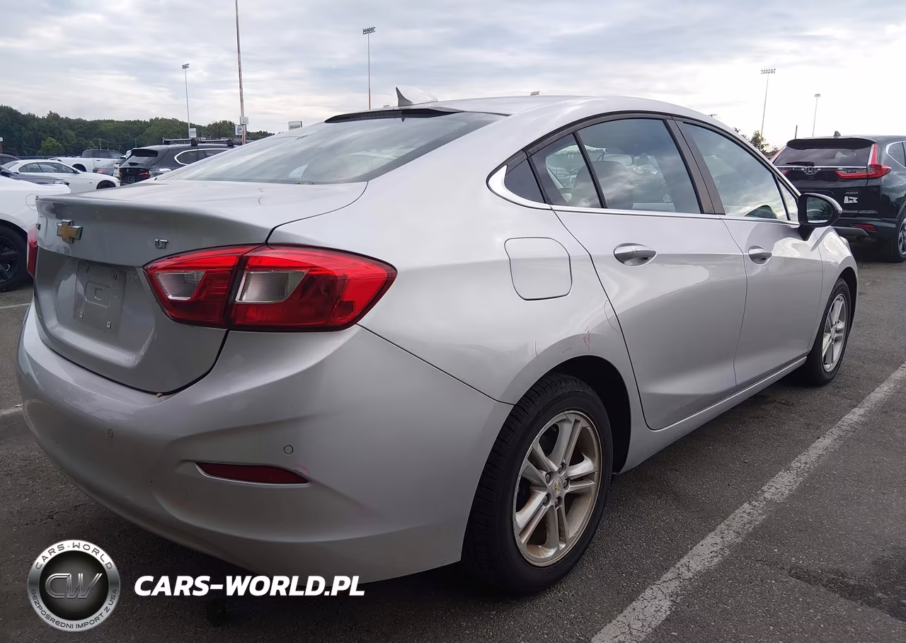 2018 Chevrolet Cruze Lt Auto VIN:1G1BE5SMXJ7100406 - 4