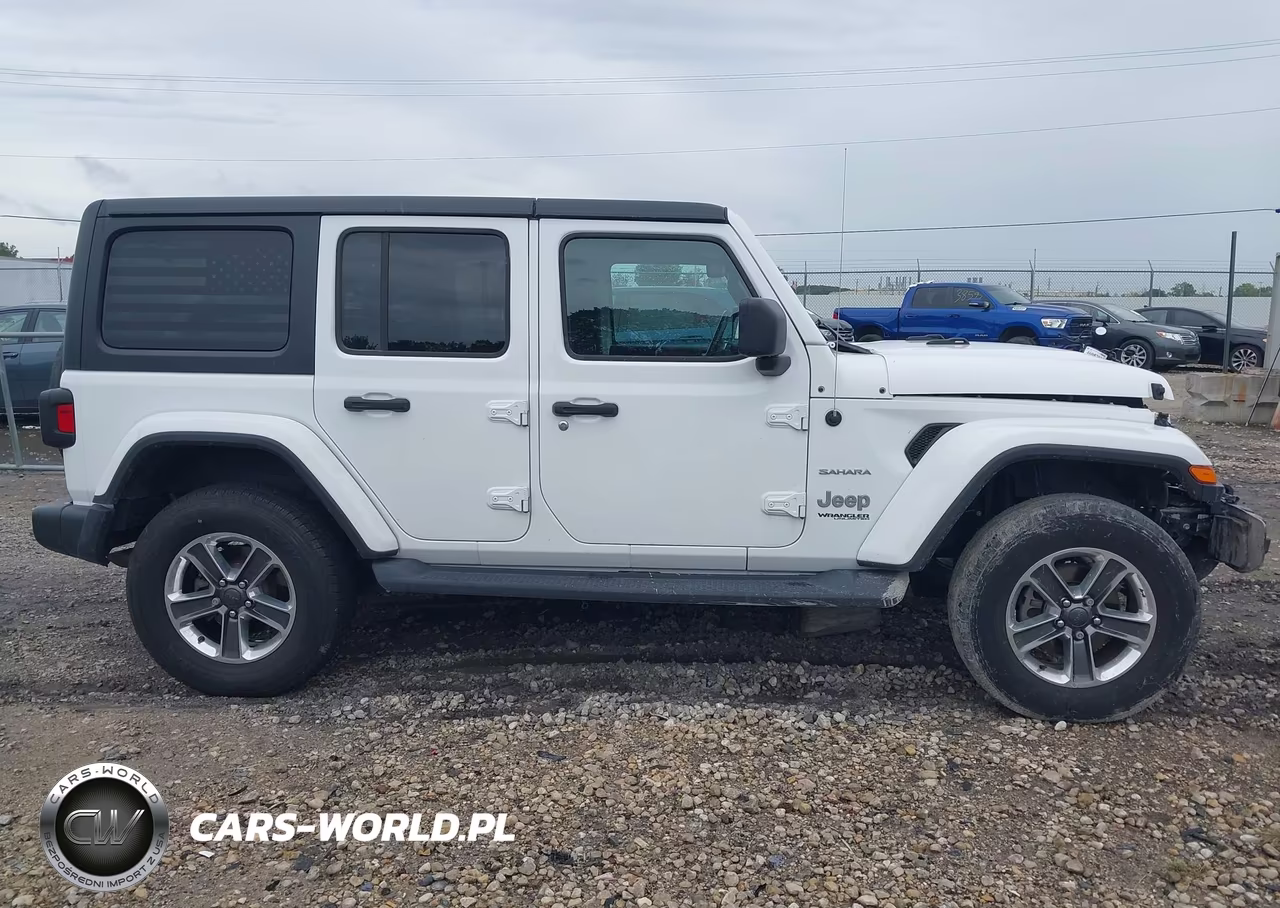 2019 Jeep Wrangler Unlimited Sahara 4X4 VIN:1C4HJXEG9KW555818 - 13