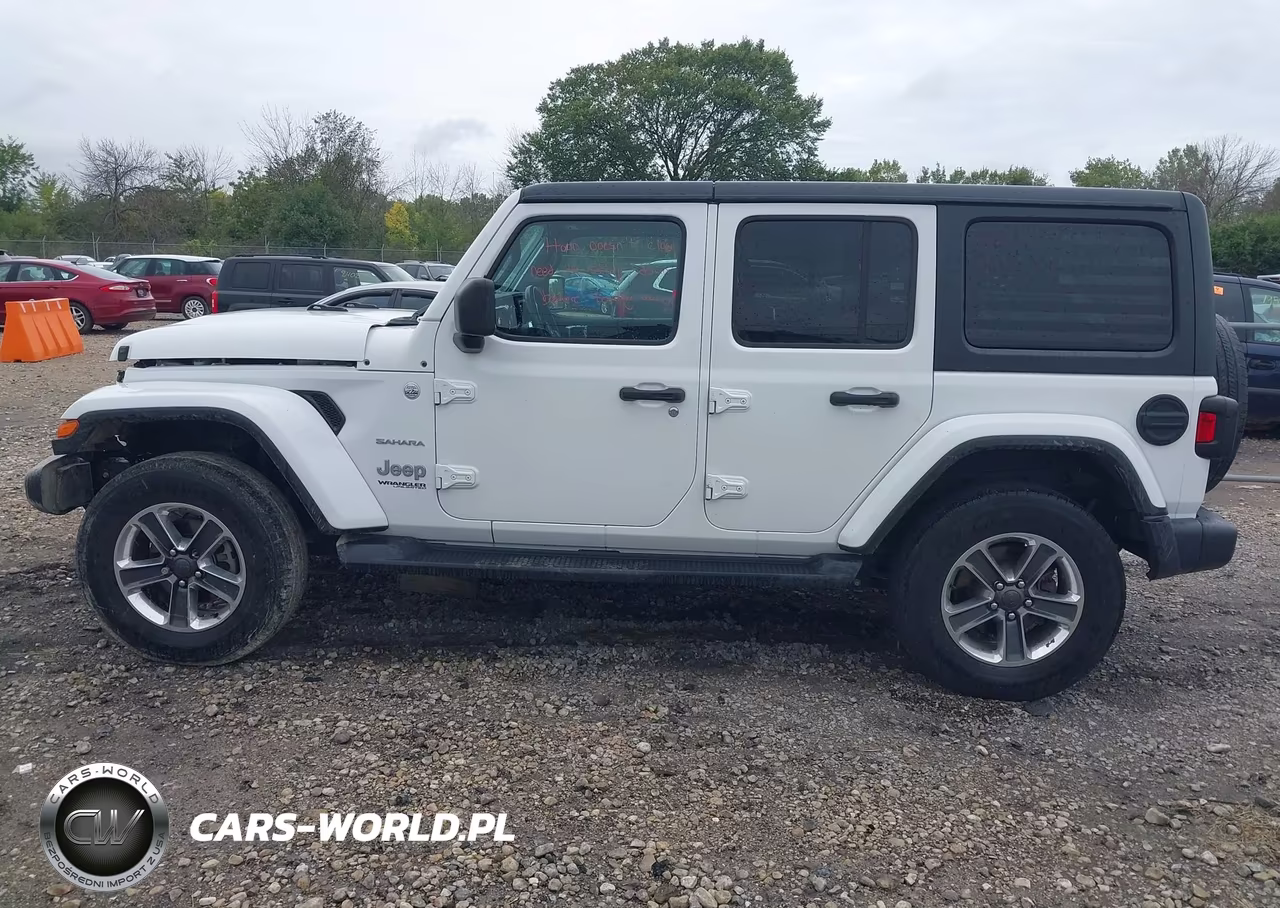 2019 Jeep Wrangler Unlimited Sahara 4X4 VIN:1C4HJXEG9KW555818 - 14