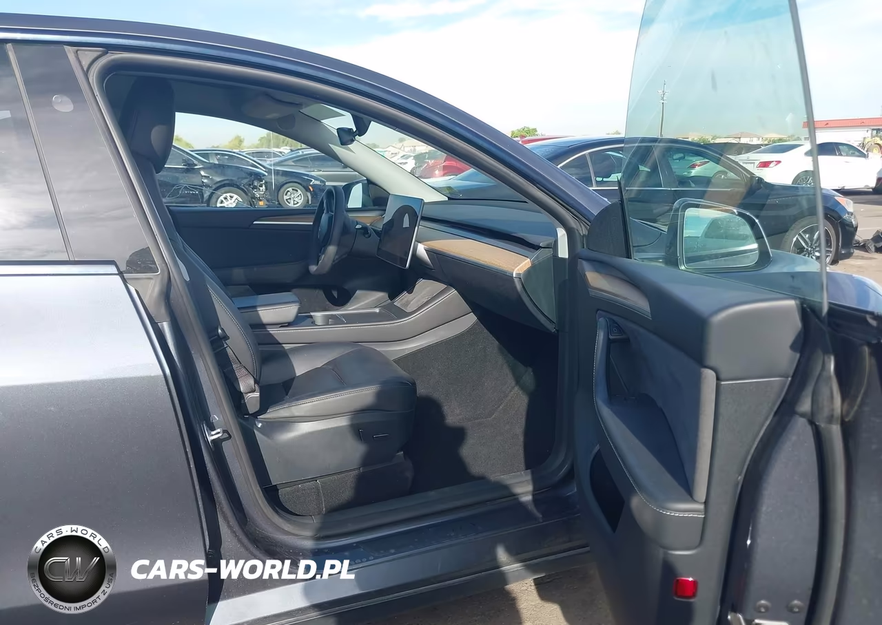 2023 Tesla Model Y Performance Dual Motor All-Wheel Drive VIN:7SAYGDEF0PF864838 - 5