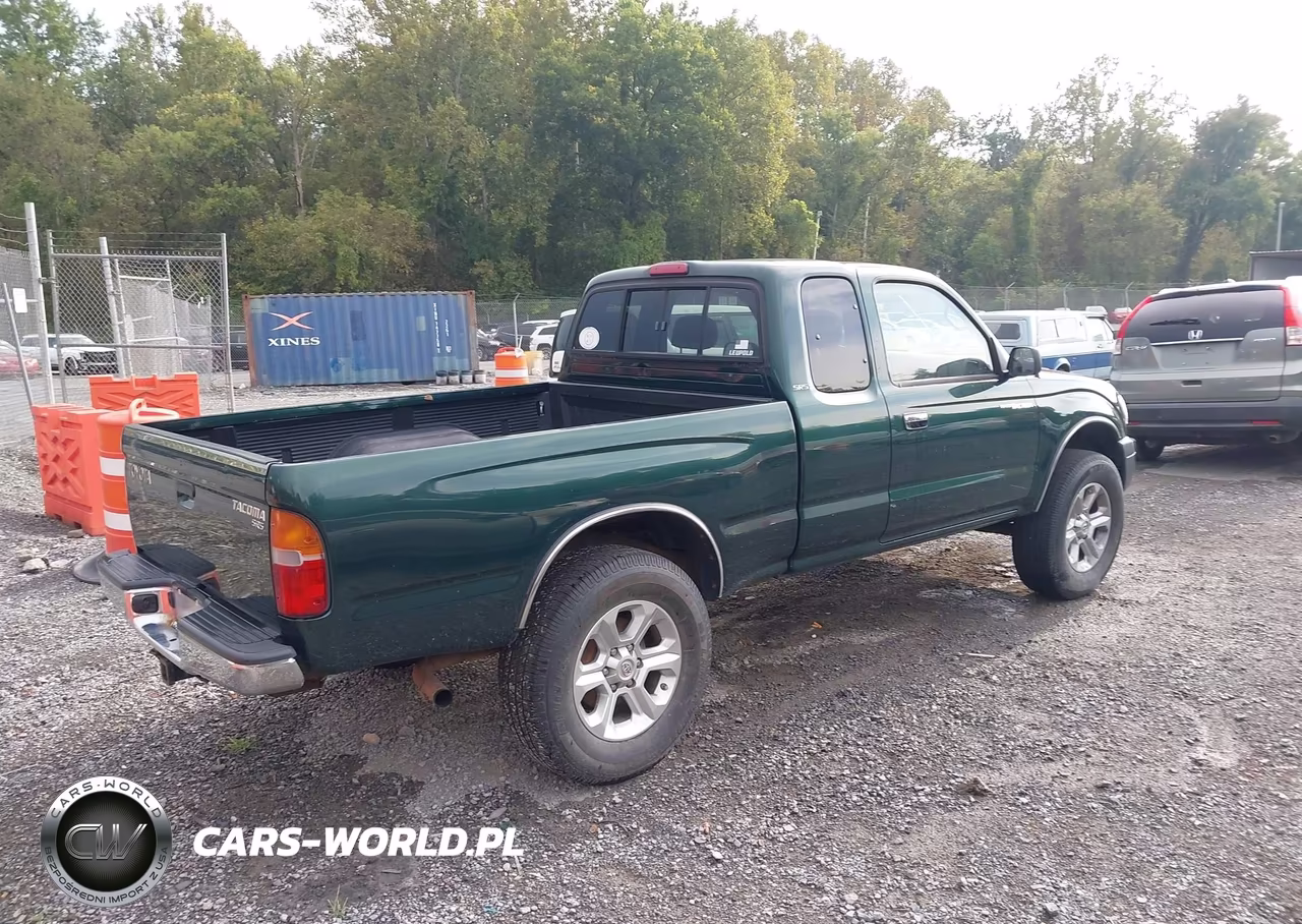1999 Toyota Tacoma VIN:4TAWM72NXXZ430135 - 4