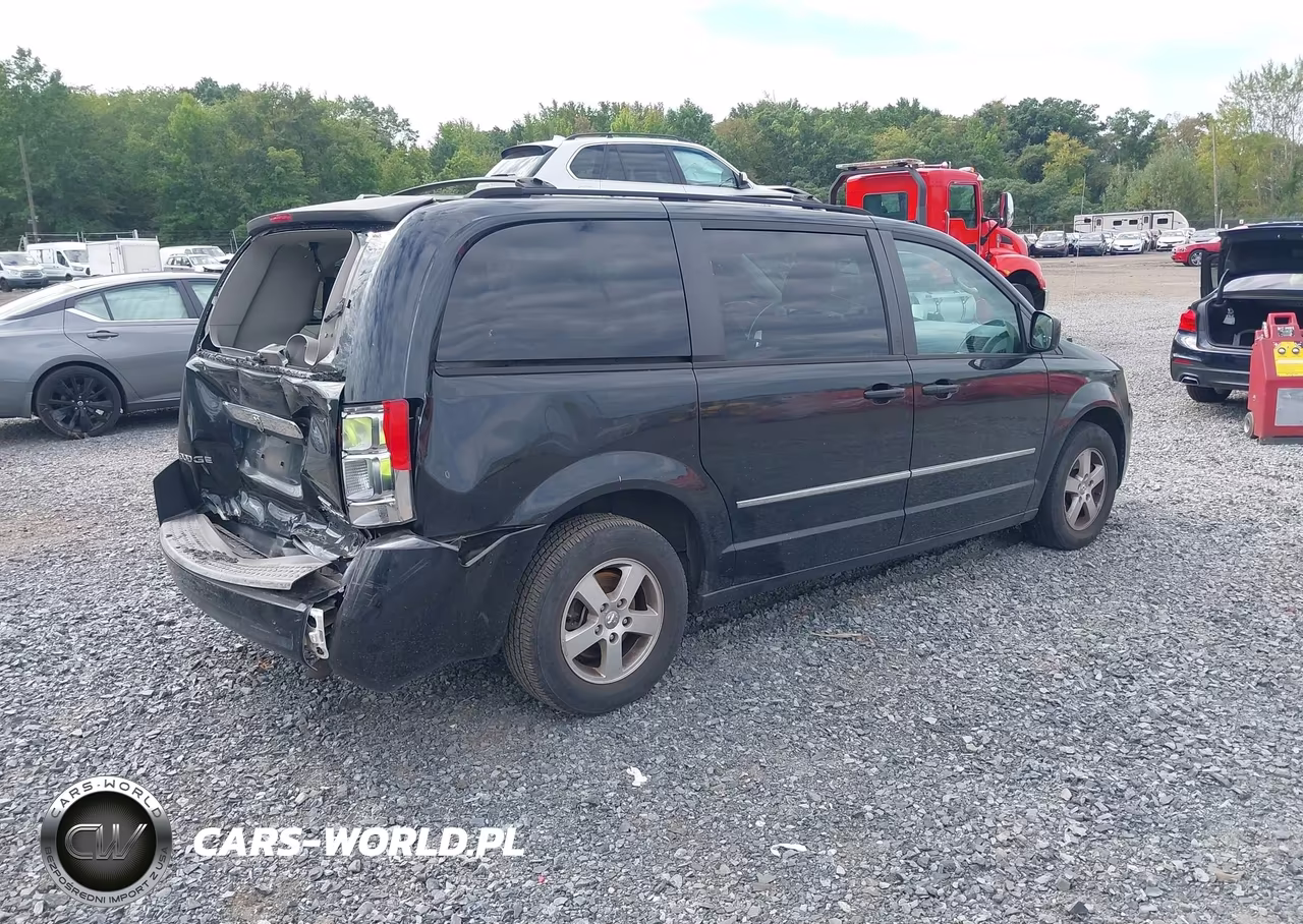 2010 Dodge Grand Caravan Sxt VIN:2D4RN5D17AR203082 - 4