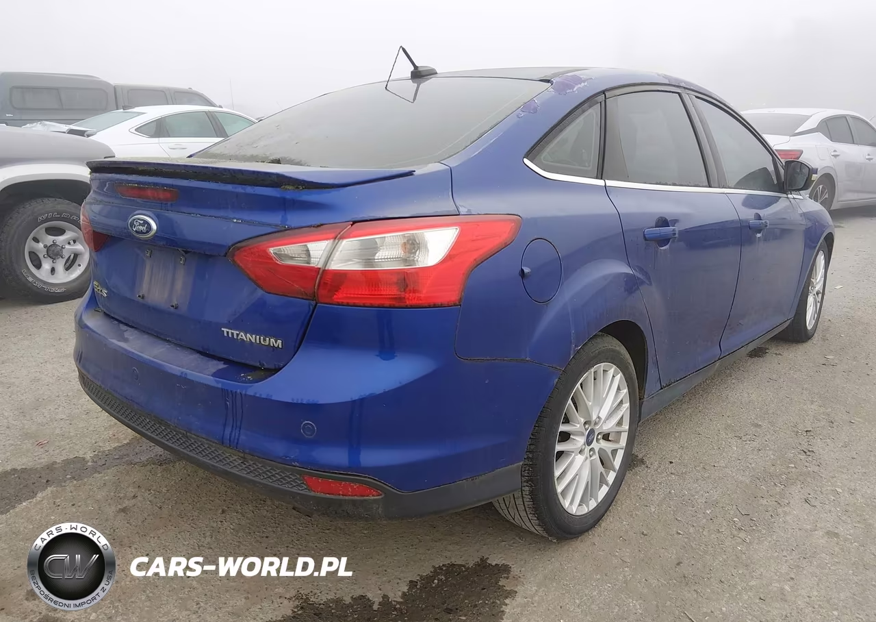 2014 Ford Focus Titanium VIN:1FADP3J24EL312249 - 4