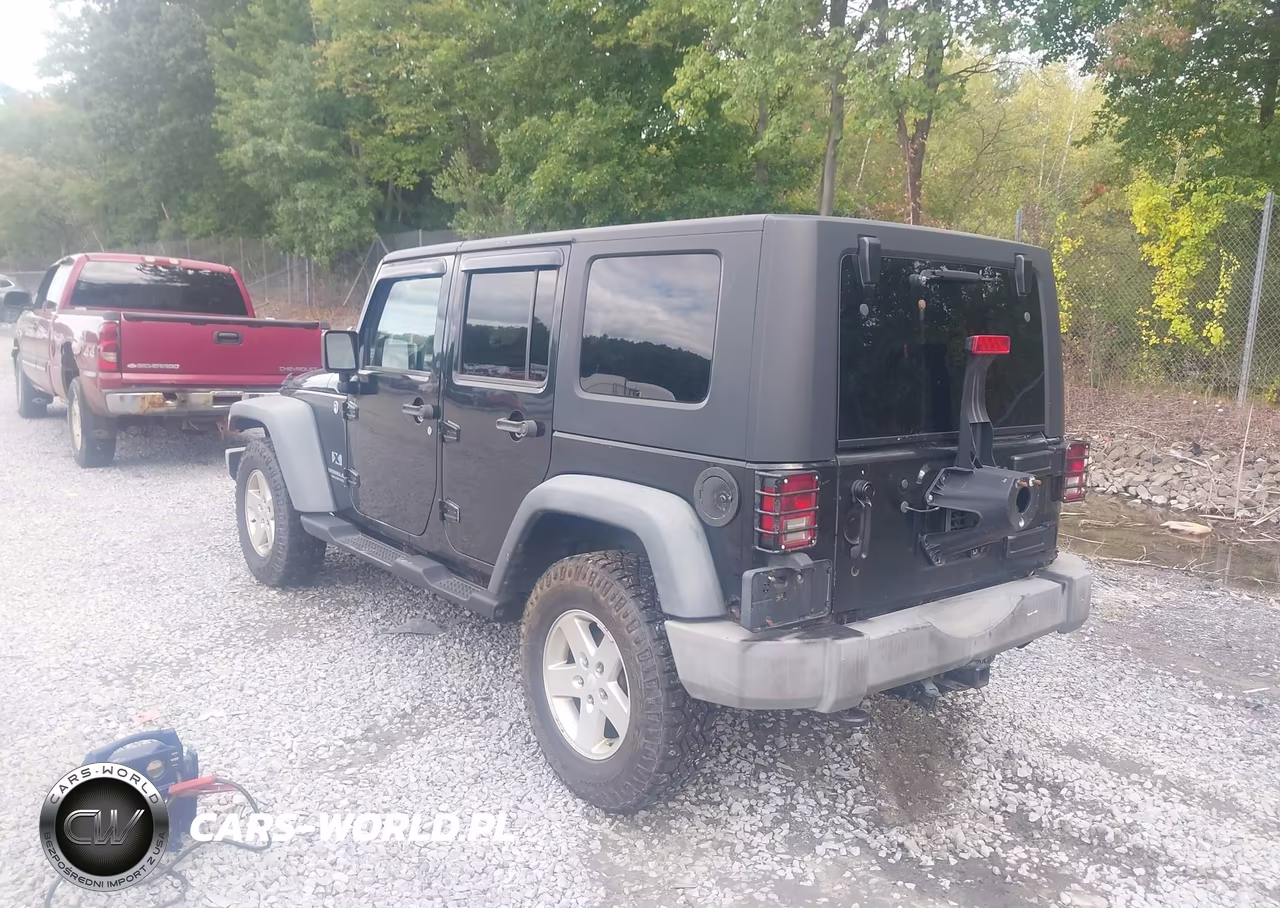 2009 Jeep Wrangler Unlimited X VIN:1J4GA39129L763989 - 3