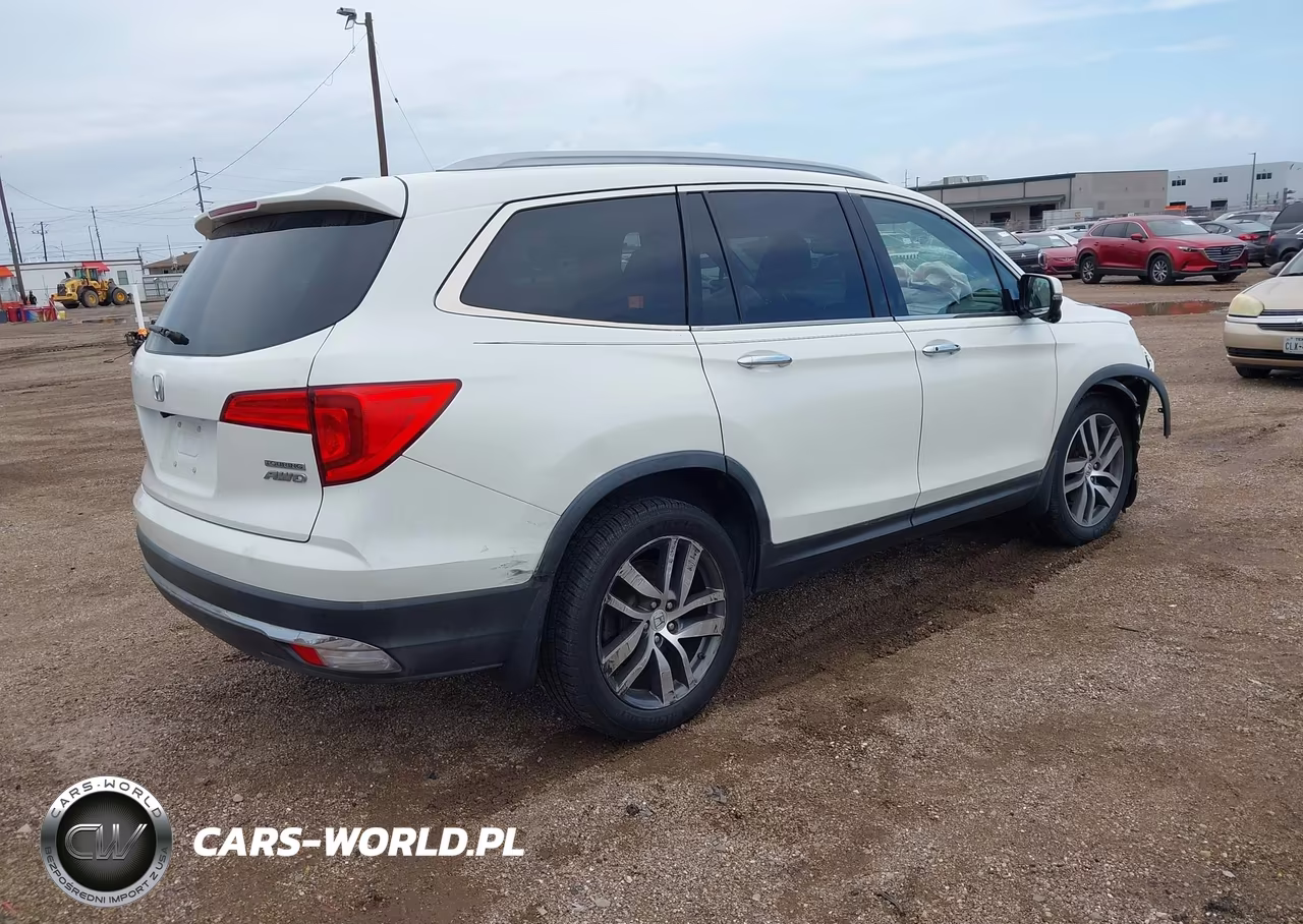 2017 Honda Pilot Touring VIN:5FNYF6H90HB006031 - 4