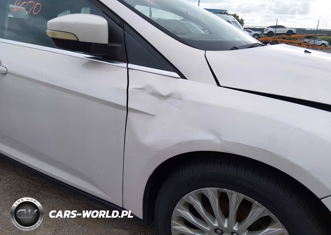 2012 Ford Focus Titanium VIN:1FAHP3N21CL150198 - 6