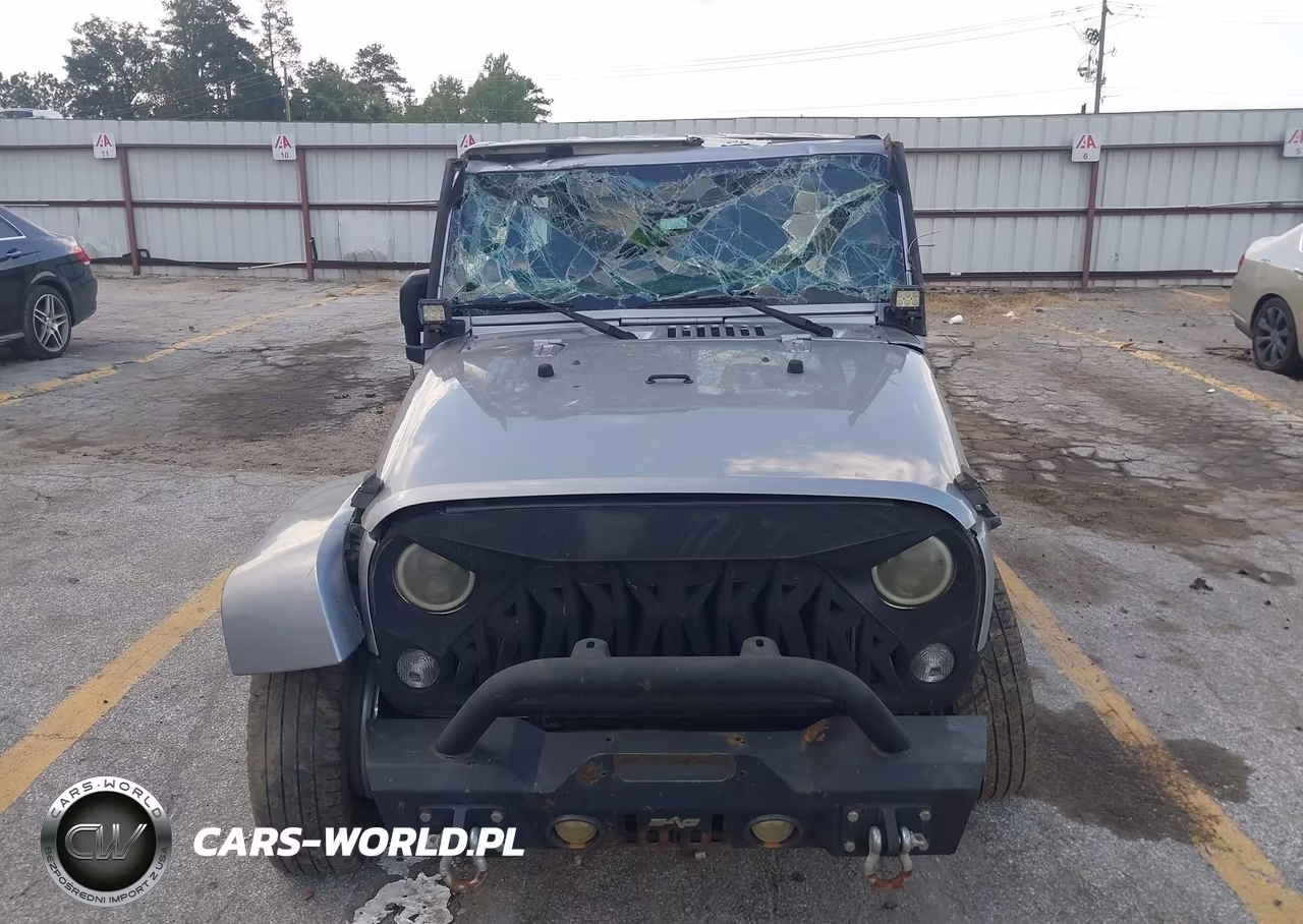 2014 Jeep Wrangler Unlimited Sahara VIN:1C4HJWEG3EL198099 - 12