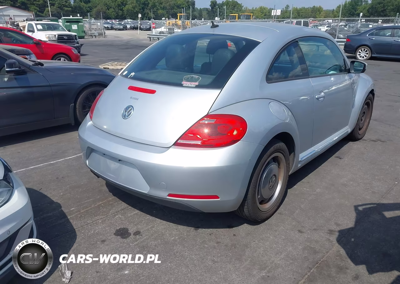 2012 Volkswagen Beetle 2.5L VIN:3VWJP7AT0CM608214 - 4