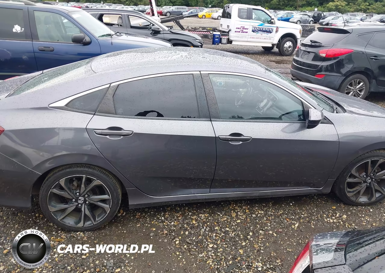 2019 Honda Civic Sport VIN:2HGFC2F86KH540611 - 13