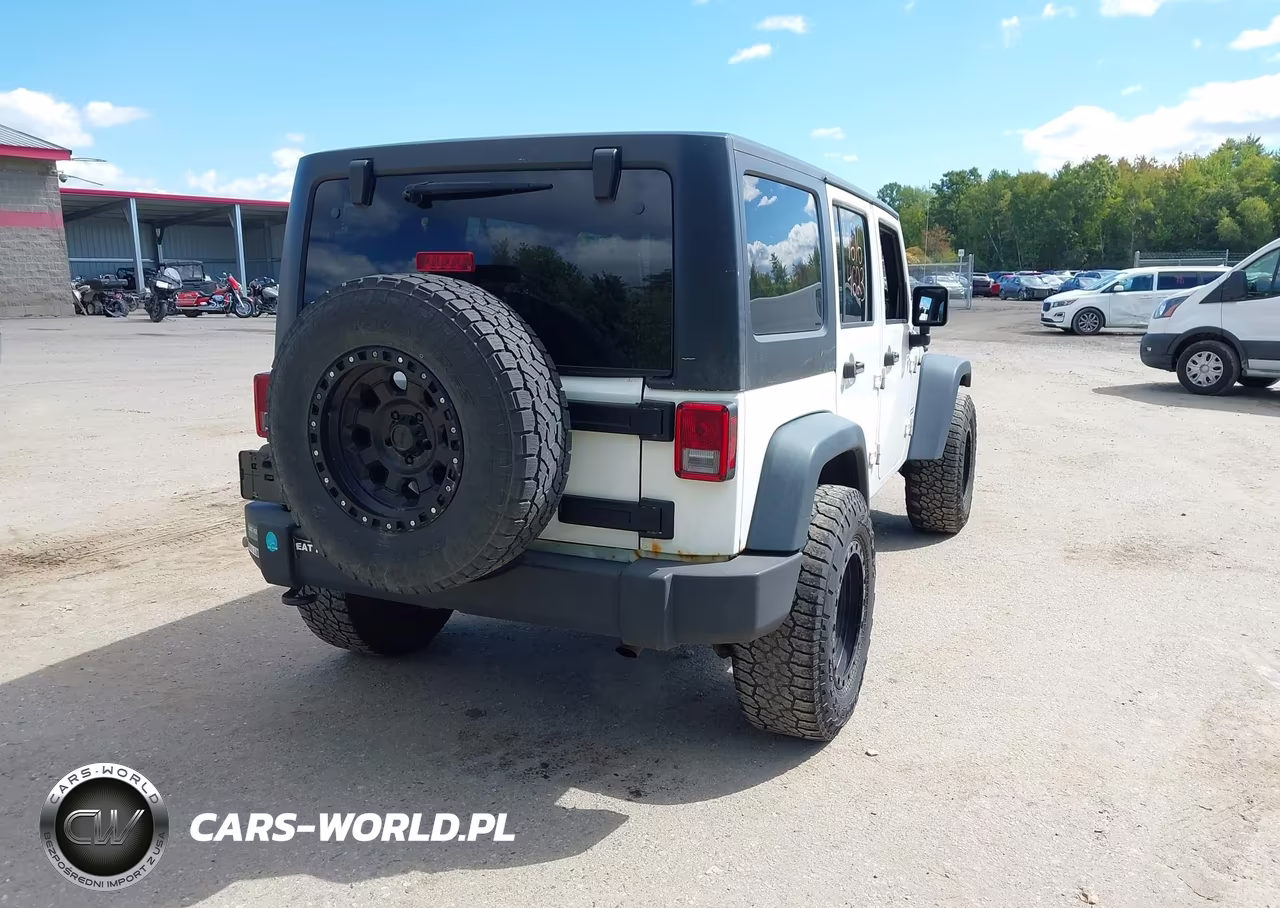 2014 Jeep Wrangler Unlimited Sport VIN:1C4BJWDG3EL194674 - 4